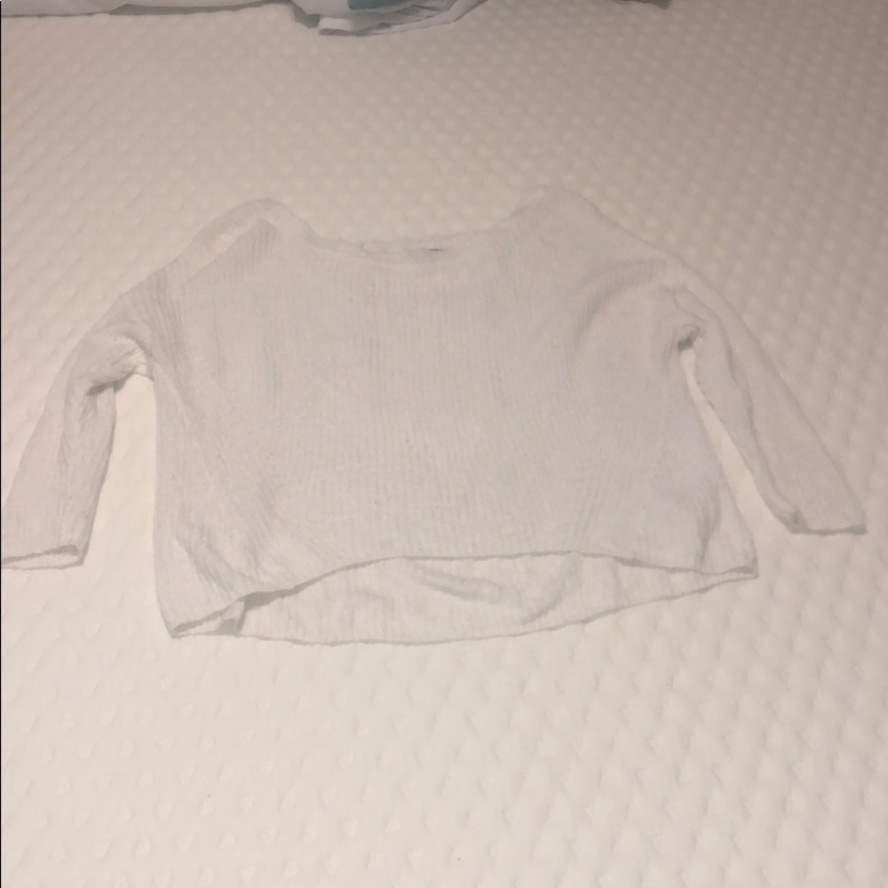 White Express sweater with back cut outs